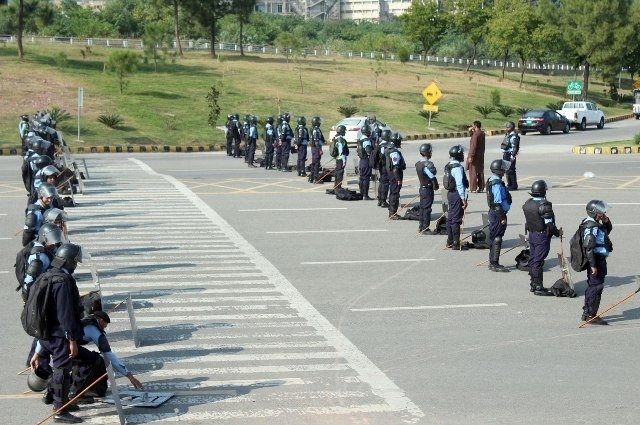 Azadi March Police Official slits his own throat