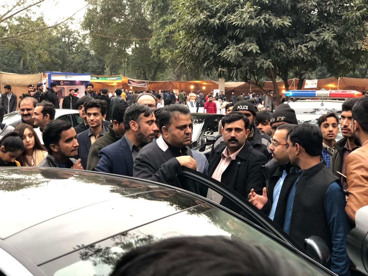 PTI’s Fawad spotted in PPP leader’s car with another friend from PML-N