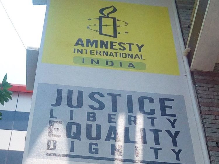 Amnesty International halts operations in India after government freezes bank accounts