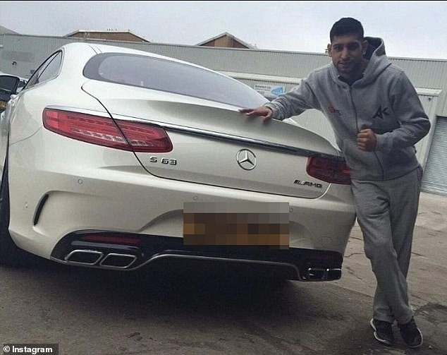 Amir Khan escapes unhurt after crashing Mercedes