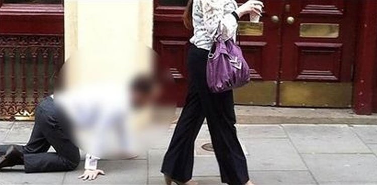 Woman fined for walking husband on leash to escape curfew rules