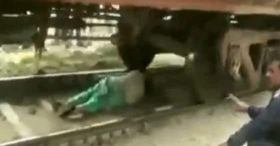 VIDEO: Woman escapes getting crushed by moving train