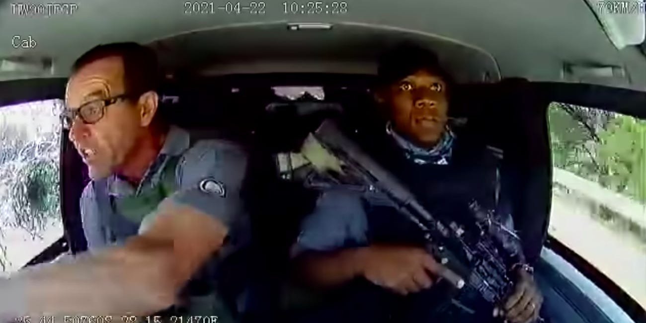 VIDEO: Two officers escape firing from robbers