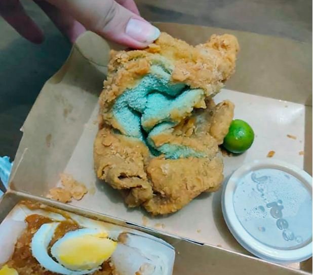 Woman finds deep-fried towel in chicken