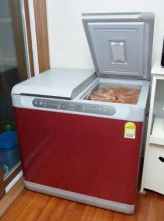 Man finds thousands of dollars taped under a second-hand refrigerator