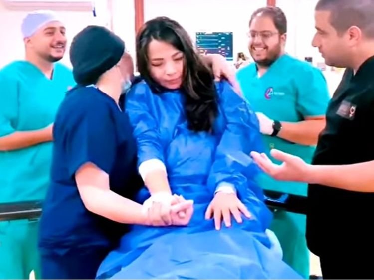 VIDEO: Doctors sing to calm scared patient before surgery