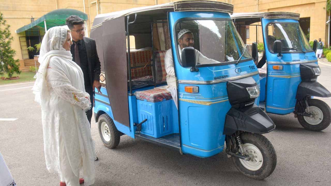 First Lady distributes specially built rickshaws among those with disabilities