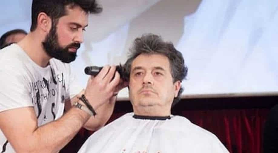 Stylist sets world record, gives haircut in just 47 seconds
