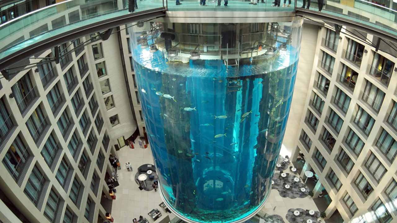 World’s largest cylindrical aquarium with 1,500 exotic fish bursts in Berlin