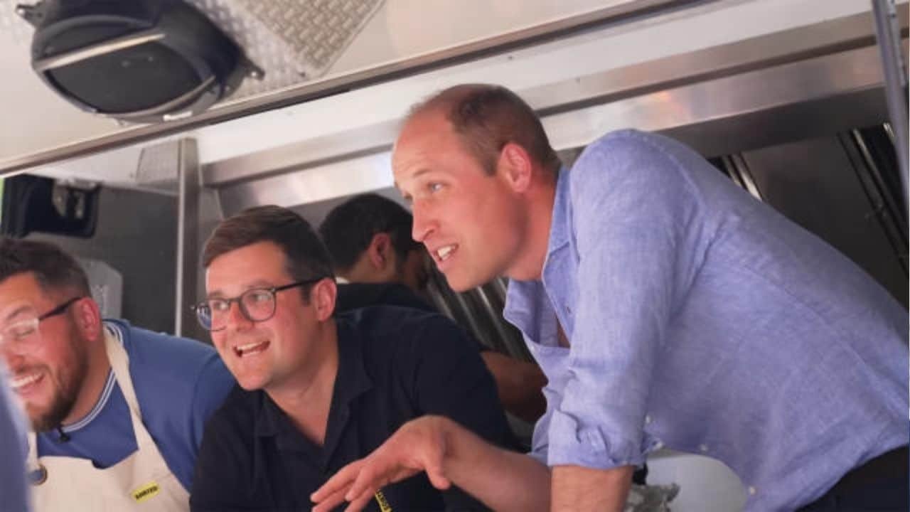 Surprised diners get served burgers by future King of England