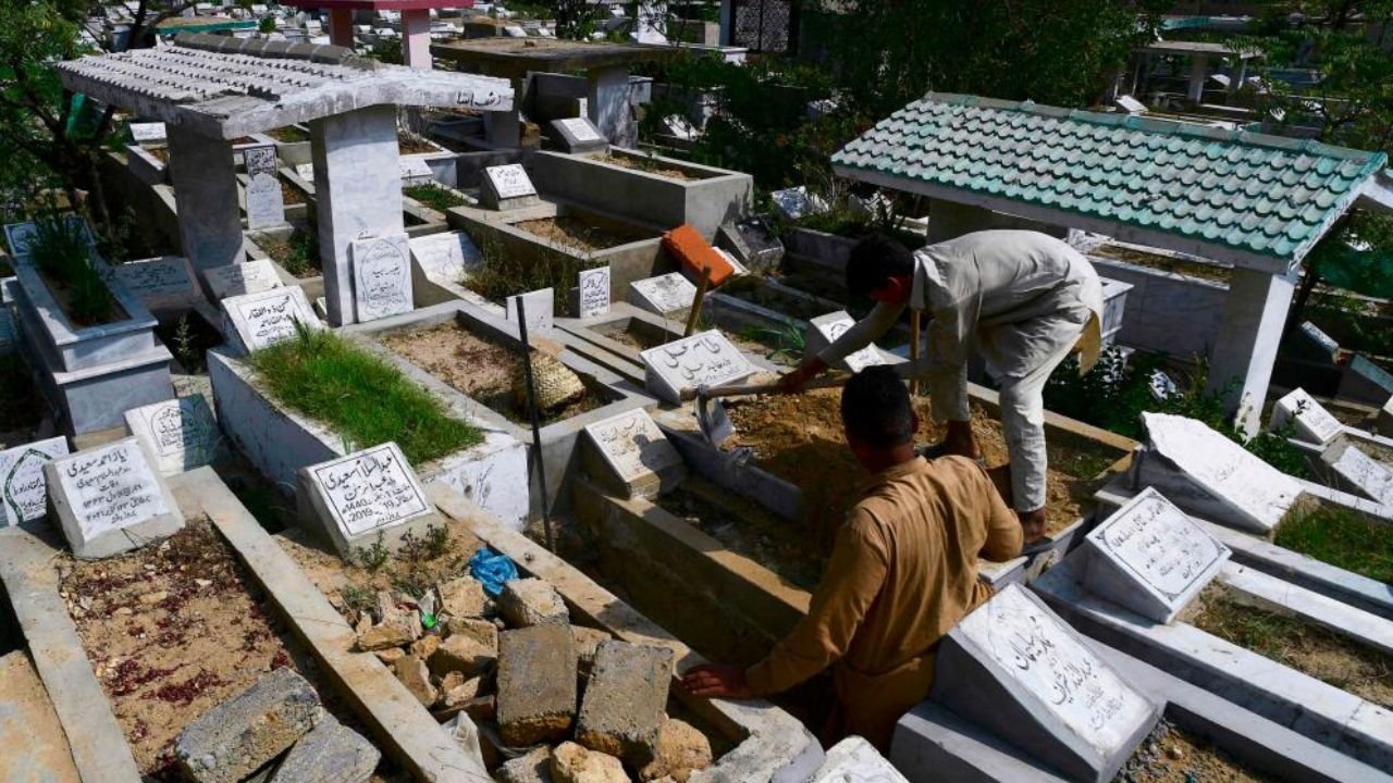 ‘Bury them properly’; man digs up children’s graves