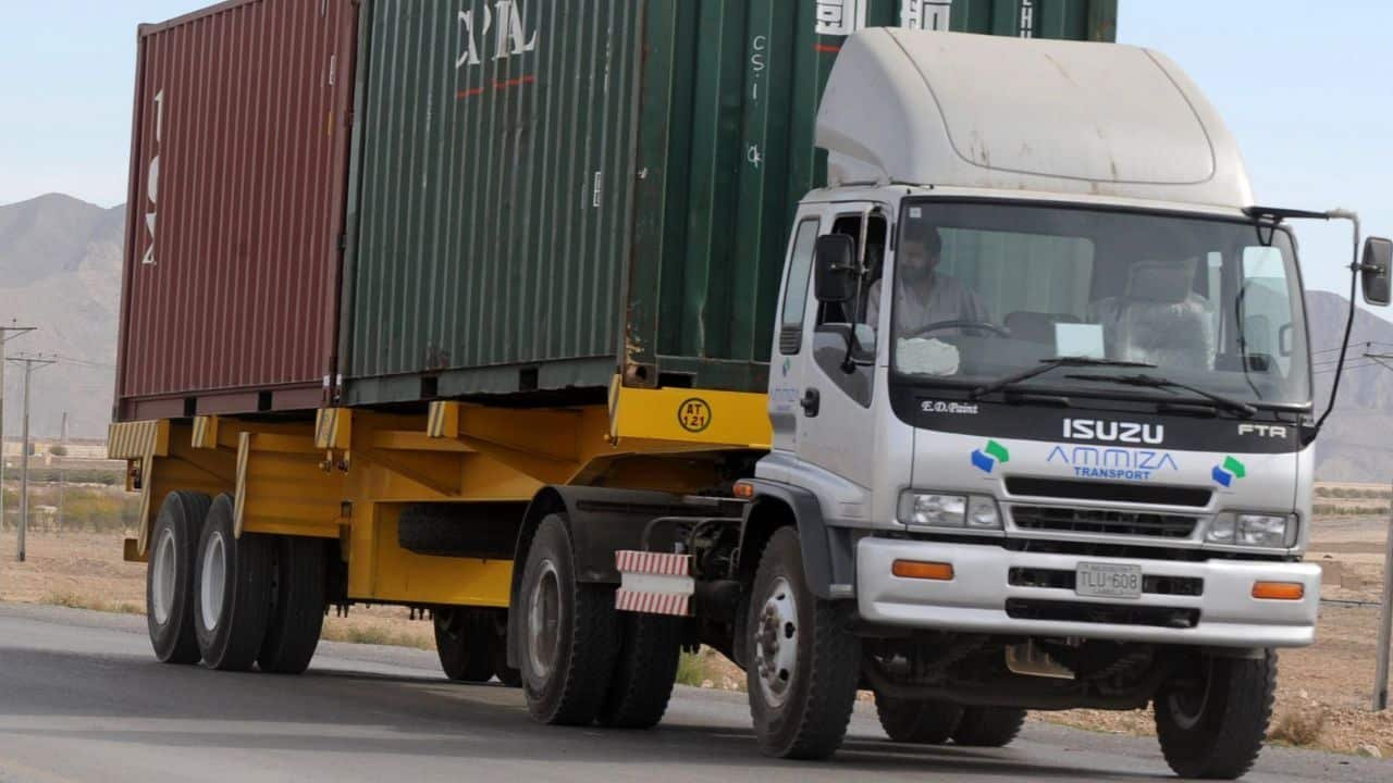 Two dead after container carrying expelled Afghans overturns