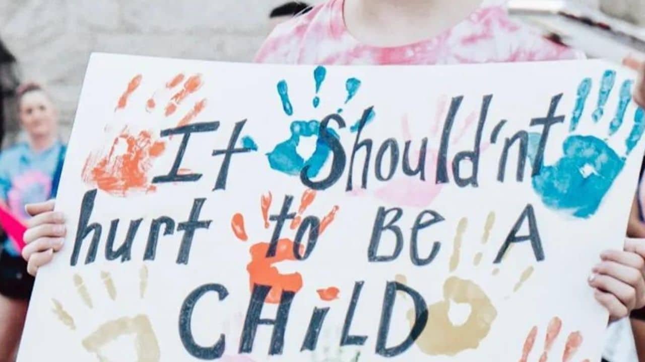 Watch: Man beats child for hitting his car with a football