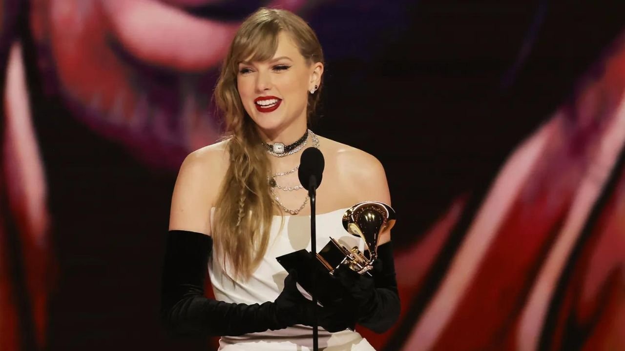 Swifties swoon as Taylor Swift wins record fourth best album Grammy, beating Frank Sinatra