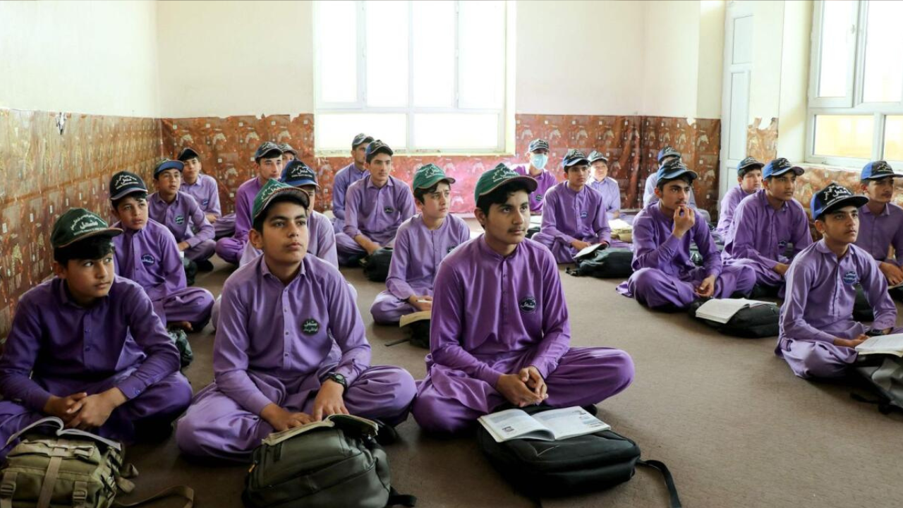 Afghan schools restart, with girls barred for third year running