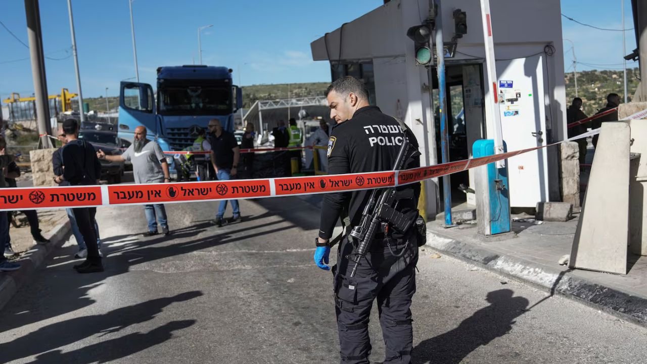 Teenager on bicycle stabs two Israelis at West Bank checkpoint