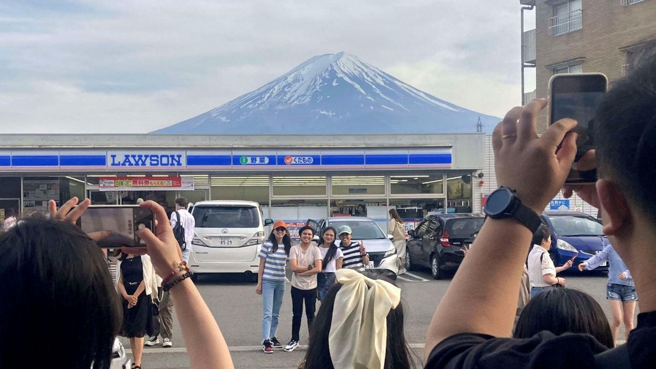 Japan town begins blocking Mt Fuji view from ‘bad-mannered’ tourists
